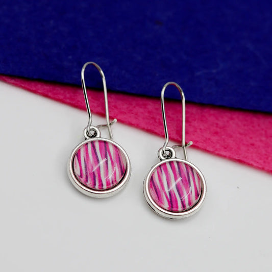 vibrant pink and purple wavy glass dome earrings