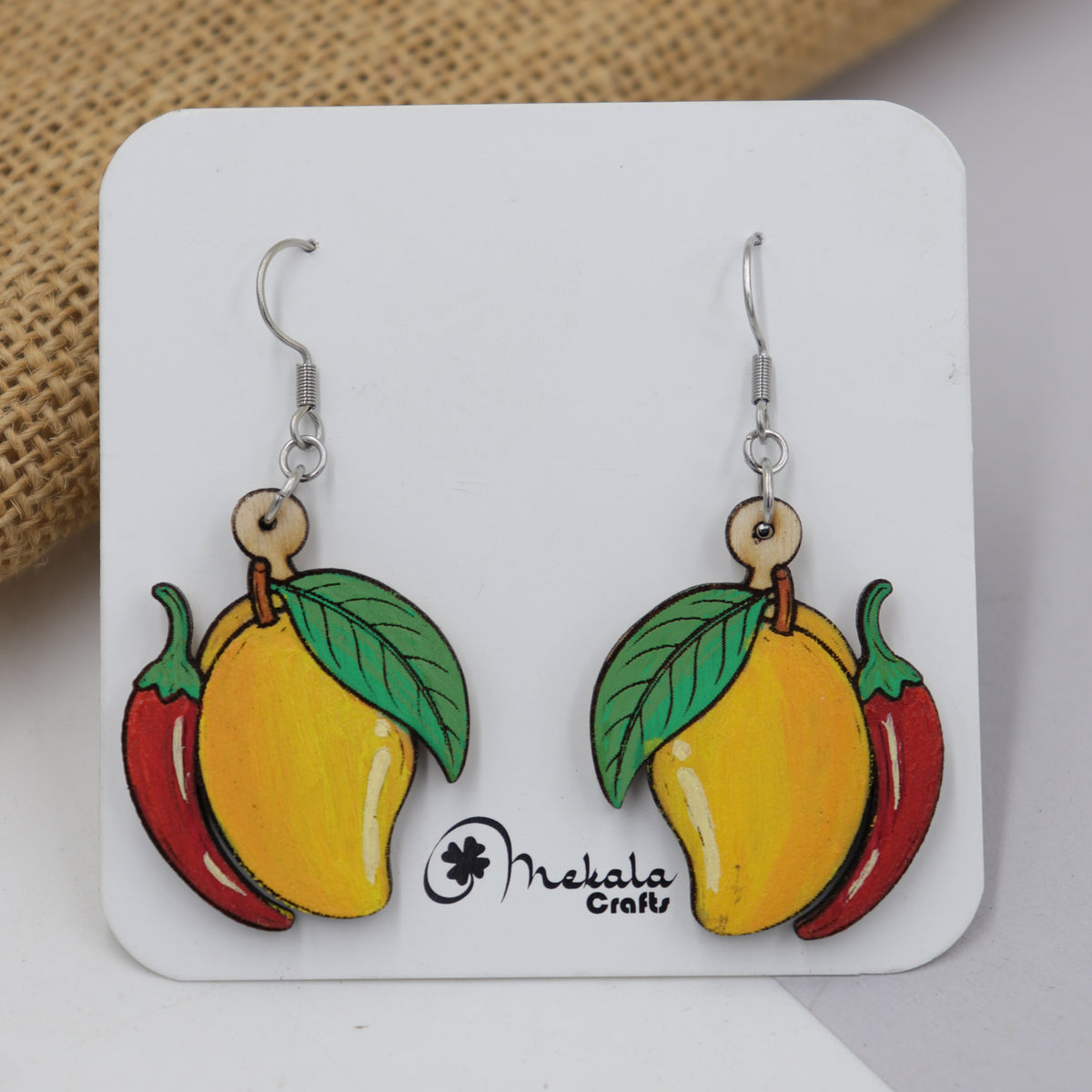 Hand-painted wooden mango and red chilli dangle earrings with green leaf, handmade by Mekala Crafts