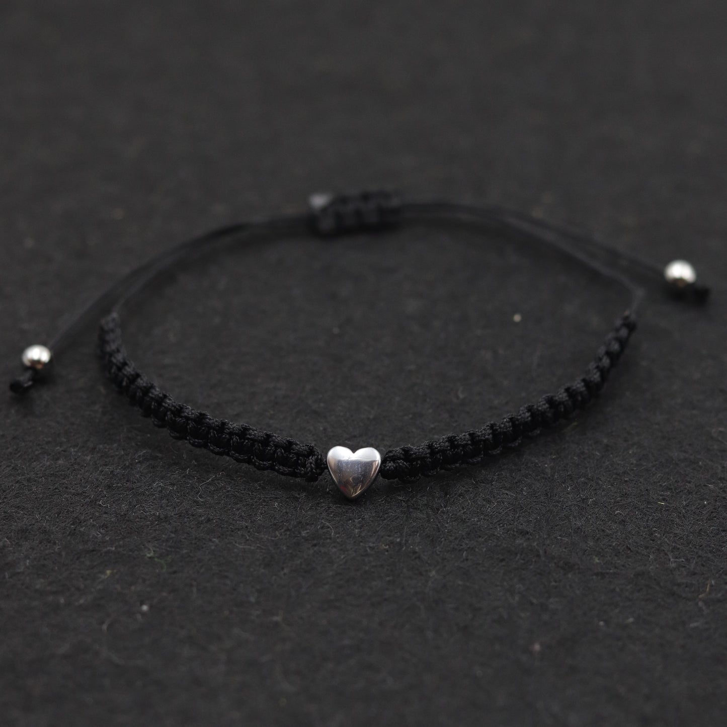 Unisex Braided Black Cord Bracelet with Silver Heart Bead – Adjustable Friendship Jewelry