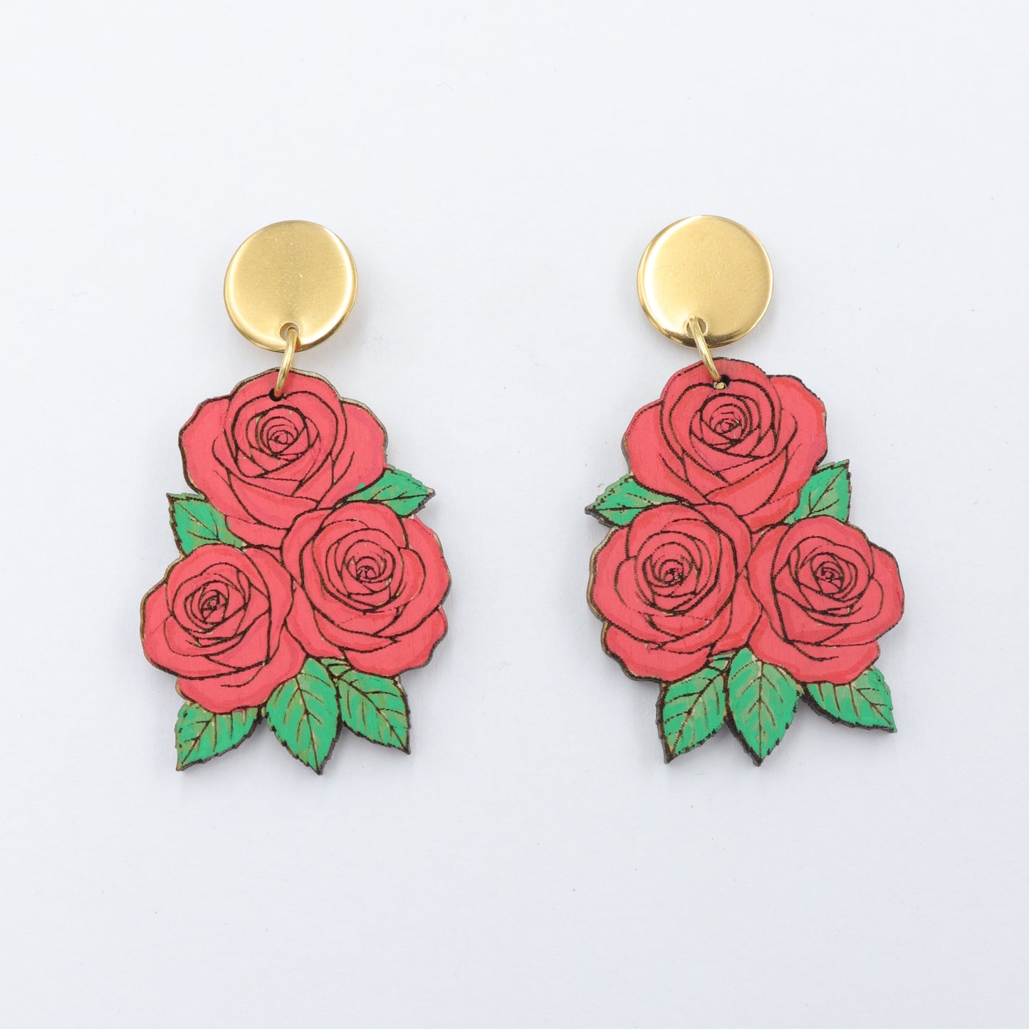Rose-shaped earrings with gold posts on a white background