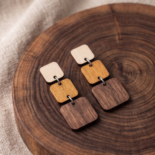 Three-tier ombre wooden square dangle earrings in natural wood tones, handmade by Mekala Crafts