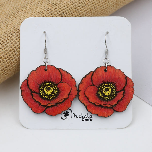Red poppy flower wooden dangle earrings with hand-painted yellow center, handmade by Mekala Crafts
