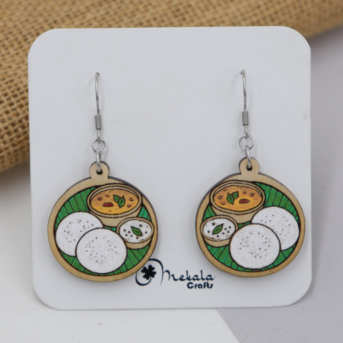 Hand-painted wooden idli sambar chutney on banana leaf dangle earrings, South Indian food jewelry by Mekala Crafts